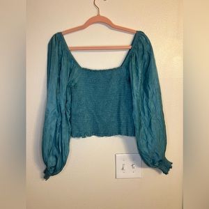 Francesca’s blue blouse